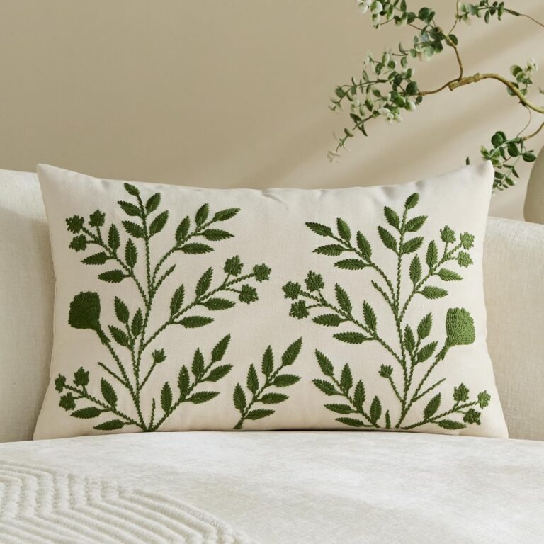 Green embroidered throw pillow